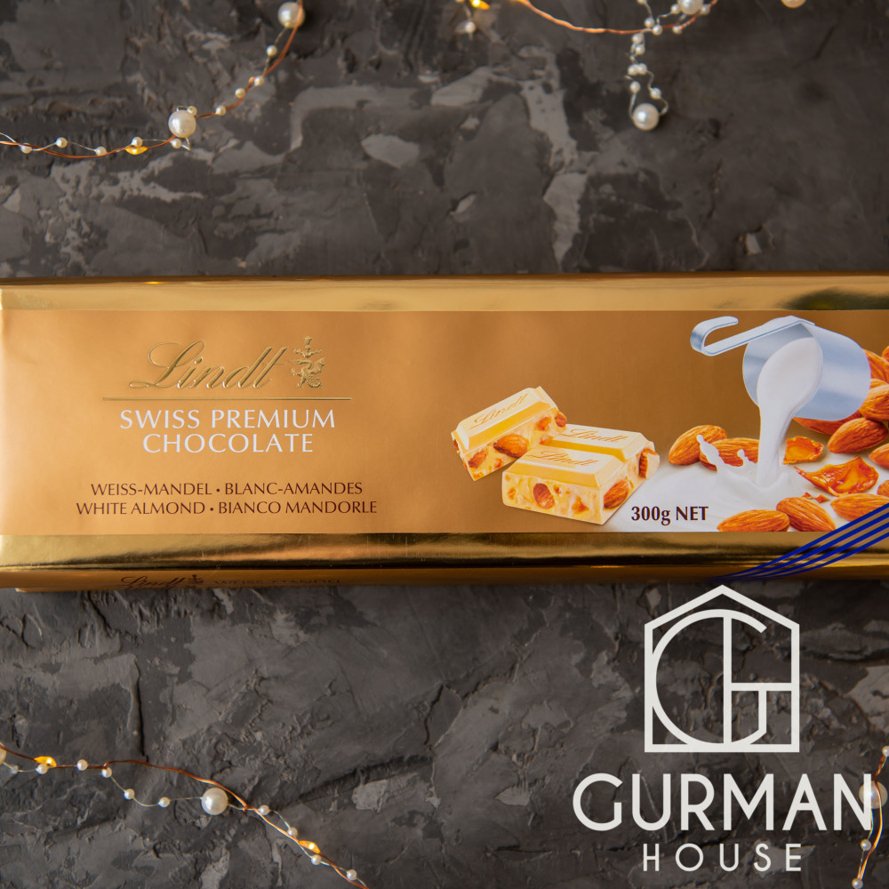 Купить Белый шоколад Lindt Gold с цельным миндалем 300 г в Украине